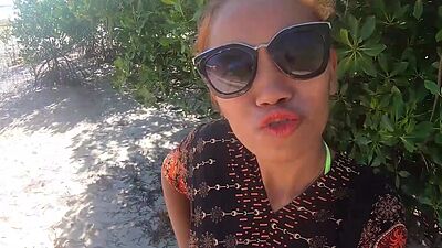 Petite amateur Thai teen Cherry fucked by a big white cock at the beach