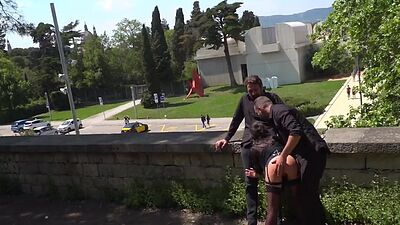 Public babe deepthroating outdoor while spanked in 3some