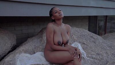 Bombastic massive titted ebony beauty Nyla reveals her hairy pussy outdoor