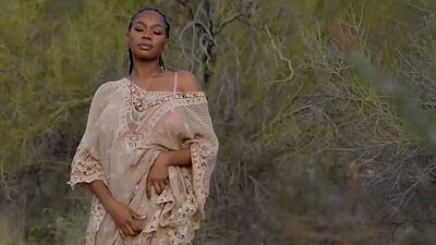 Bombastic massive titted ebony beauty Nyla reveals her hairy pussy outdoor