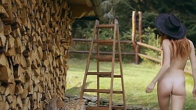 Small titted redhead Russian naked babe Kate Great chopping wood outdoor