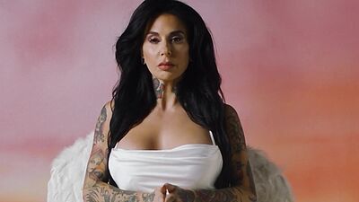 Busty MILF Joanna Angel shows her luscious body with tattoos for Playboy