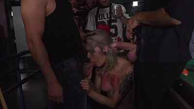 Public humiliated slut rims mans ass in front of voyeurs