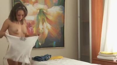 Brunette has her tits cum covered after a massage