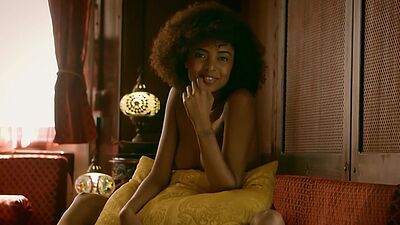 Curly ebony model shows perfect petite body after hot striptease action