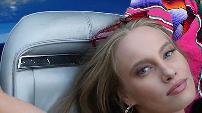 Hot brunette teen posed by the sport car and babe exposed her stunning body