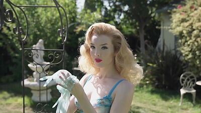 Skinny all natural naked blonde muse Miranda watering her plants outdoor