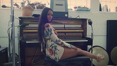 Stunning ebony big ass MILF Harley Dean posed in the studio in hot lingerie