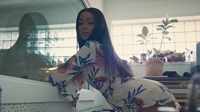 Stunning ebony big ass MILF Harley Dean posed in the studio in hot lingerie