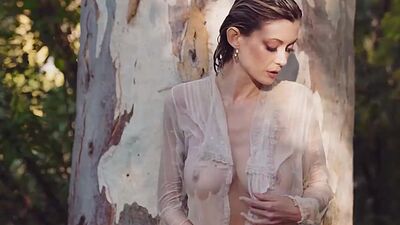 Totally wet teen model shows perfect big tits during outdoor posing action