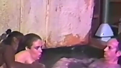 Promiscuous babe blows and rides cock in pool threeway