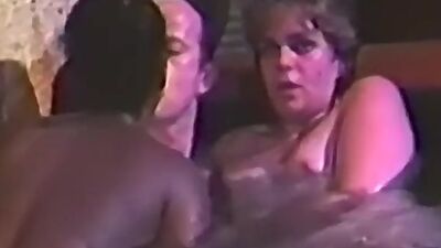 Promiscuous babe blows and rides cock in pool threeway