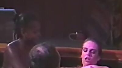 Promiscuous babe blows and rides cock in pool threeway