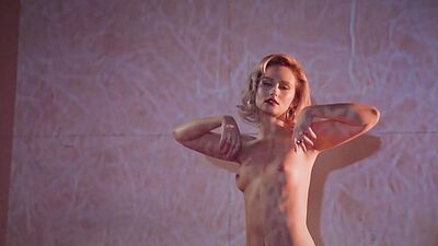 Big round ass MILF blonde Polina striptease for Playboy in a convertible