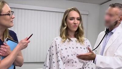 Doctor testing busty inked surrogate patient