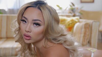 Blonde asian muse Kazumi Squirts reveals her big boobs and her exotic pussy