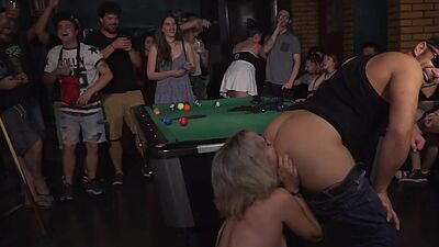 Public BDSM slut rims guys asshole in front of voyeurs