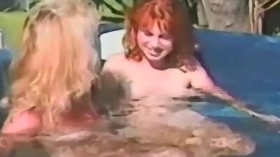Vintage dykes have fun in jacuzzi before tongue fucking