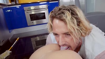 Hardworking young lady cleans the kitchen before pounding