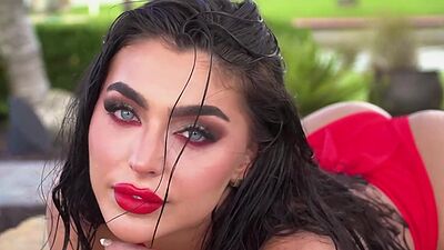 Glamorous all natural Emjay Rinaudo stripped and posed by the pool outdoor