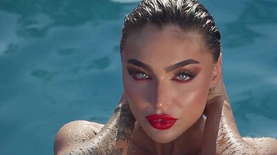 Glamorous all natural Emjay Rinaudo stripped and posed by the pool outdoor