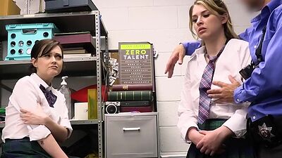 Jade and Riley submit themselves to the officer in charge