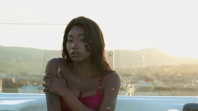 Ebony mermaid Mimi Desuka reveals her big natural boobs in the jacuzzi