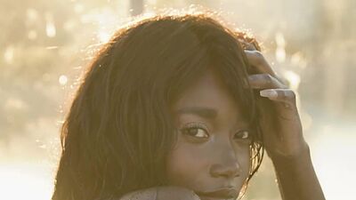 Ebony mermaid Mimi Desuka reveals her big natural boobs in the jacuzzi