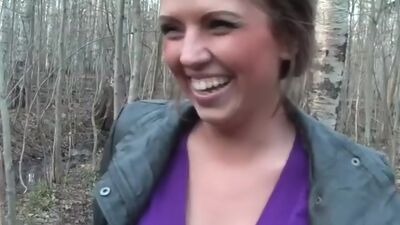 Busty girl gives public blowjob