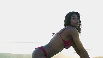 Petite black teen model Mimi Desuka posed outdoor and showed hoy wet body