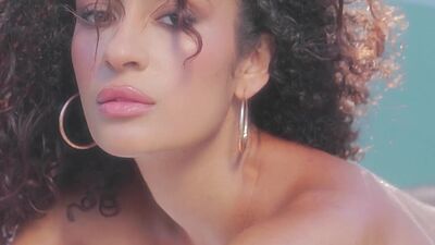 Curly Latina teen model shows stunning body and posed naked and painted