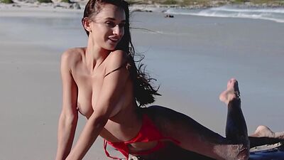 Skinny all natural Ukrainian babe Gloria Sol stripping at the beach outdoor