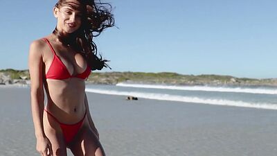 Skinny all natural Ukrainian babe Gloria Sol stripping at the beach outdoor