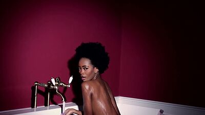 Skinny naked ebony babe Alicia reveals her black pussy in the bathtube