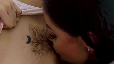 Busty bigass Latin dyke licks hairypussy of her GF on couch
