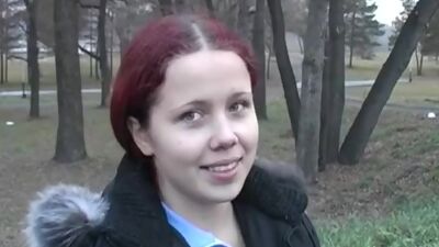 Redhead student sucks on the banks of the river for all to see