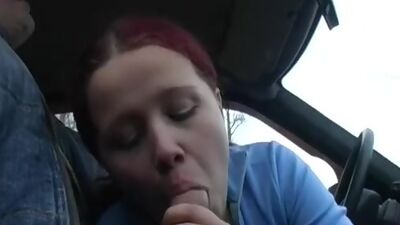 Redhead student sucks on the banks of the river for all to see