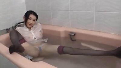 Alluring Japanese Brunette In The Bathtub