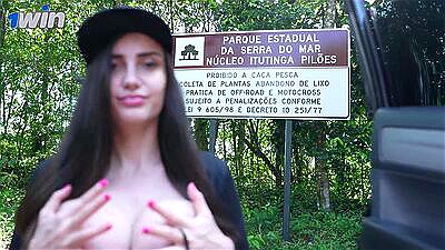 Busty brunette showing off and giving a blowjob on the avenue | Victoria RC | LP Produções
