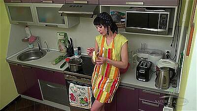 Petite short-haired housewife in high heels rubs her hairy cunt on the kitchen counter