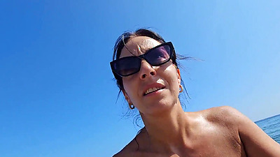 Between onlookers and passers-by we try to relax on the beach.