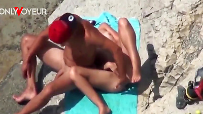 Beach Voyeur. Super horny teen getting off right on the nude beach