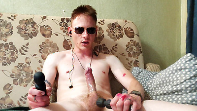 Handsome sexy guy plaing with sex-toys