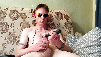 Handsome sexy guy plaing with sex-toys