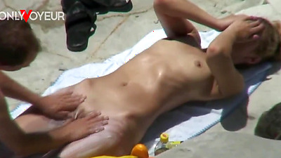 Beach Voyeur. Naughty young couple quick fuck on a rocky beach