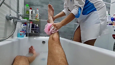 Stepmom cme in to wash her naked stepson, she ignores his big shaft, he is very excited and wants to jerk off, she flashes her big tits and starts masturbating