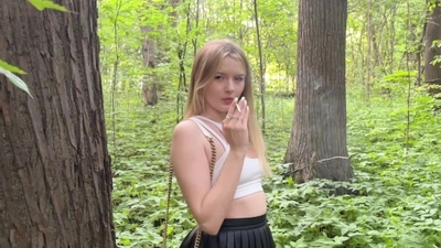 Beautiful smoking girl in the forest was fucked in butt and pissed in her mouth