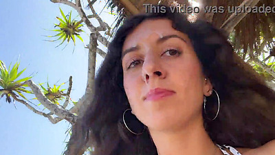 Walking with hot cum on my face on a public beach full of people - Cumwalk