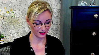 German amateur blonde MILF flashes cleavage on webcam