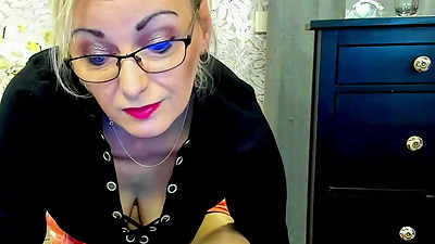 German amateur blonde MILF flashes cleavage on webcam